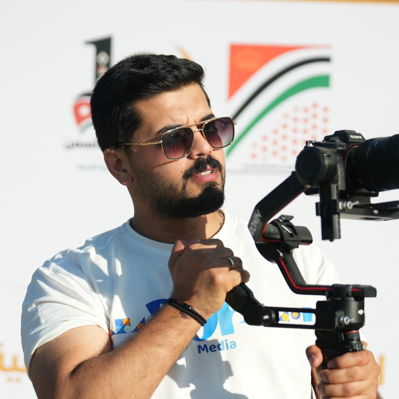 Asef Alhmoud on set with a gimbal camera